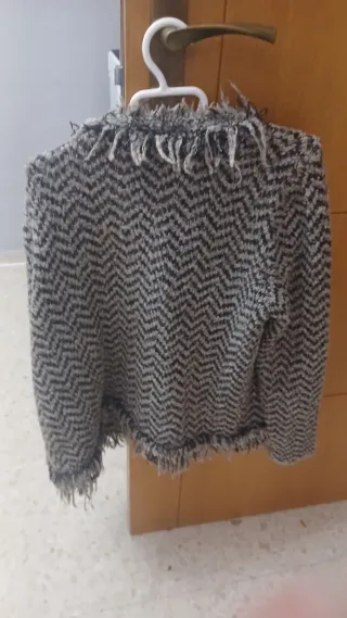 Chaqueta marrón con flecos