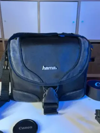 IMPECABLE Canon EOS 1000D