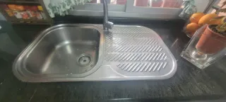 Muebles de cocina de madera con encimera de granit