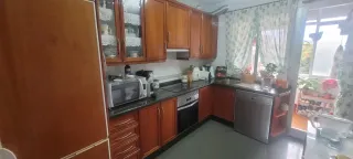 Muebles de cocina de madera con encimera de granit