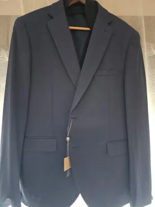 Traje de novio azul a estrenar