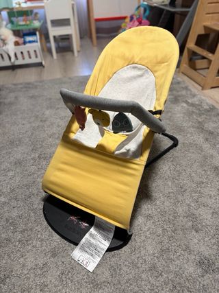 Hamaca BabyBjörn Amarilla + Juguete
