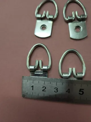 Lote 46 Colgadores de metal plateados para cuadros