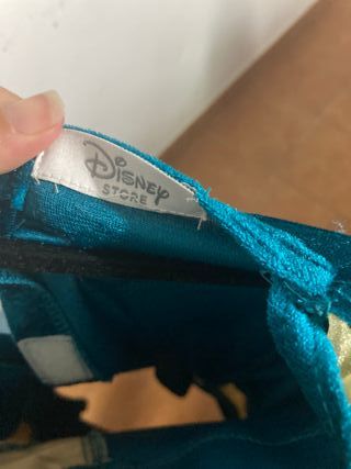 Disfraz infantil azul con detalles dorados