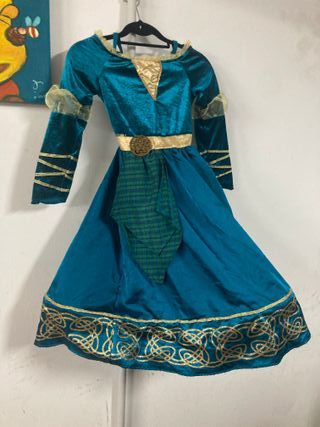 Disfraz infantil azul con detalles dorados
