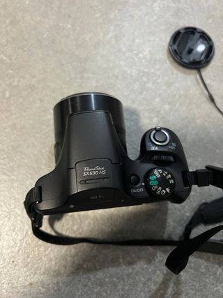 Cámara Canon con accesorios 2 baterias, tripode
