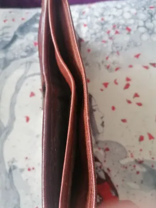 Cartera de piel para hombre.