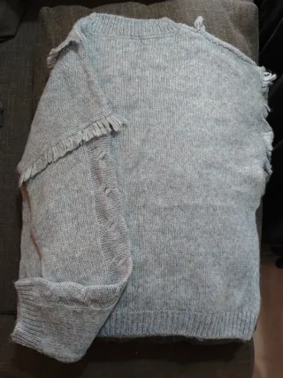 Jersey invierno gris nuevo, no se ha usado.