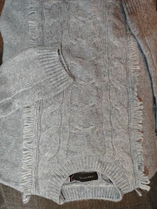 Jersey invierno gris nuevo, no se ha usado.