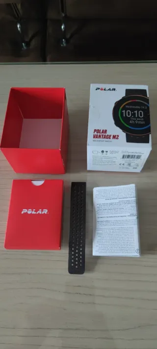 Reloj Polar Negro y Dorado