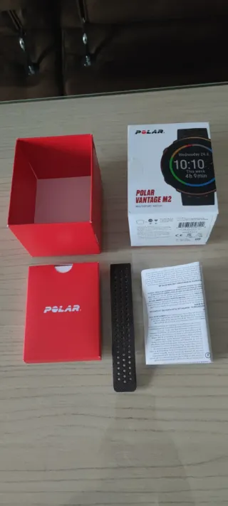 Reloj Polar Negro y Dorado