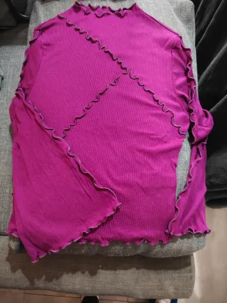 Jersey morado sin usar.