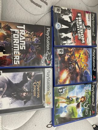 PlayStation 2,3 mandos+volante pedales+juegos