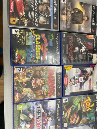 PlayStation 2,3 mandos+volante pedales+juegos