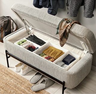 Banco de almacenaje beige y negro