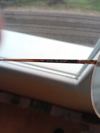 Gafas vintage doradas y marrones