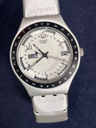 Reloj Swatch Negro y Plateado