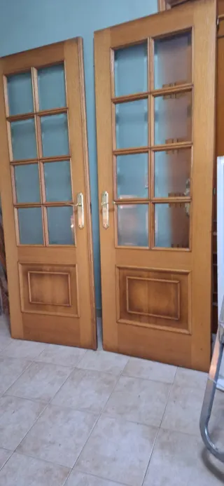 Puerta doble roble y cristal con marco