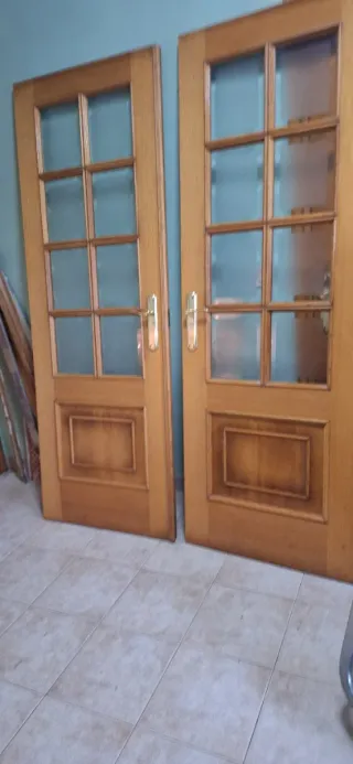 Puerta doble roble y cristal con marco