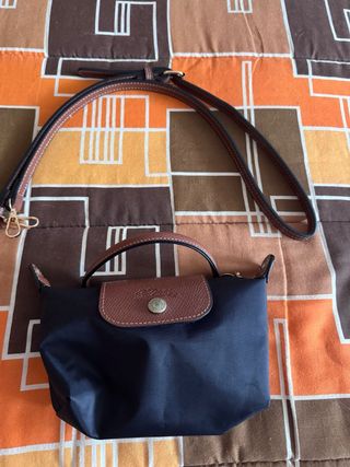 Mala pequena azul e castanha