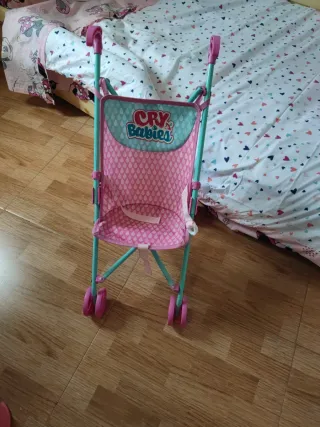 Carrito de muñecas Cry Babies