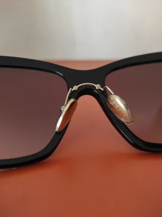 Occhiali da sole Prada neri e marroni