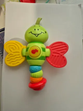 Sonajero de bebé con ruecas