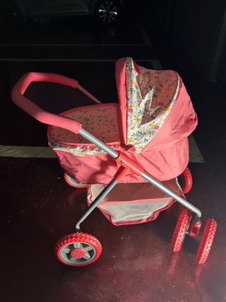 Carrito de muñecas rosa