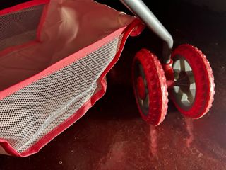 Carrito de muñecas rosa