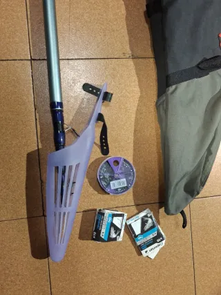 Caña de pescar Symbios 420 con accesorios.