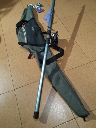 Caña de pescar Symbios 420 con accesorios.