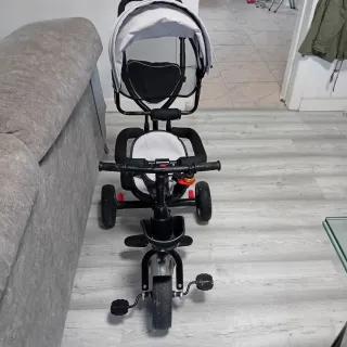 Triciclo infantil negro y blanco