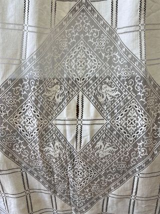 Antigua colcha encaje en mal estado