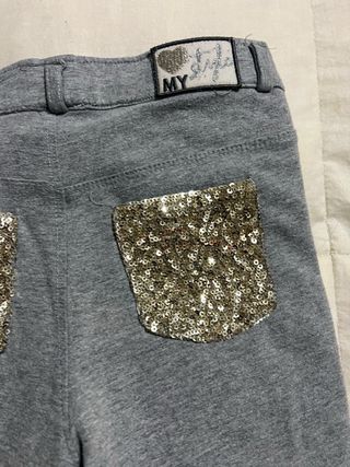 Pantaloni grigi con paillettes
