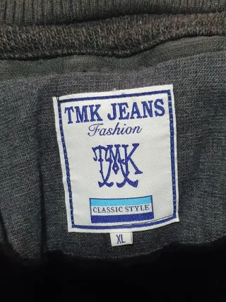 Chaqueta doble capa gris medidas axilas  60 por 87