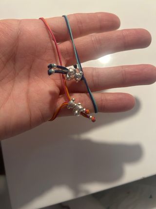 Pulseras Tous Naranja y Turquesa