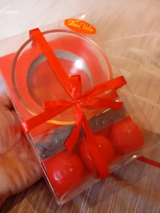 Conjunto de velas rojas y portavelas NUEVO