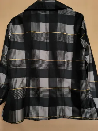 Chaqueta de vestir gris y dorada y negra