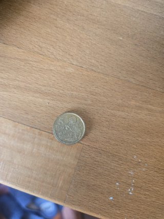 2 monedas de Suecia + 1 de India + 1 de 5 pesetas.