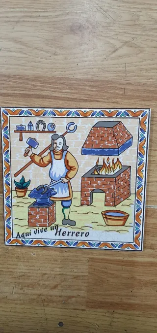 Azulejo decorativo Aquí vive un Herrero