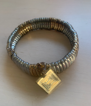 Pulsera Pertegaz elástica dorada y plateada