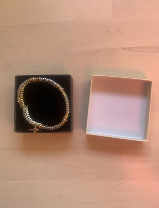 Pulsera Pertegaz elástica dorada y plateada