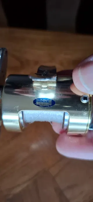 Minicarrete de pesca dorado + llavero carrete