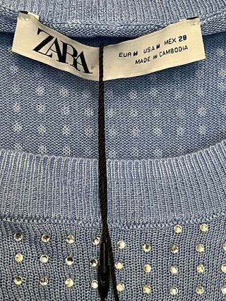 Jersey Zara azul con detalles plateados