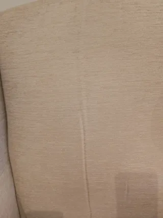 Sillón orejero beige tela