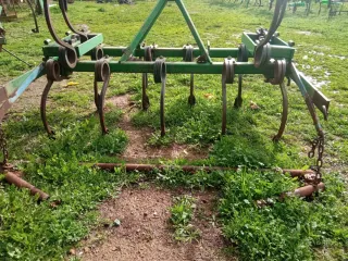 Cultivador 13 brazos con rastra