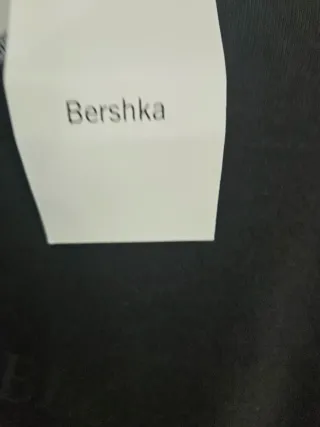 Mono Bershka negro con mensaje