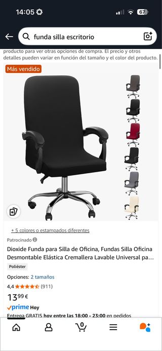 Silla negra, cómoda , funcional y desgastada
