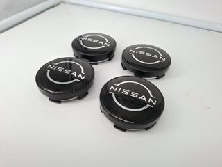 4 Coprimozzi Nissan 60mm Nuovi