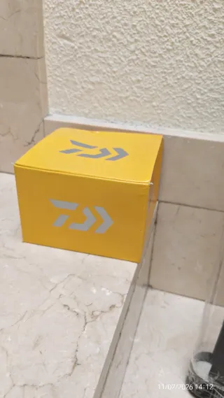 Caña y carrete de pesca spinning